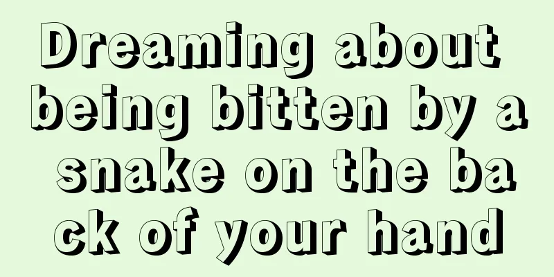 Dreaming about being bitten by a snake on the back of your hand