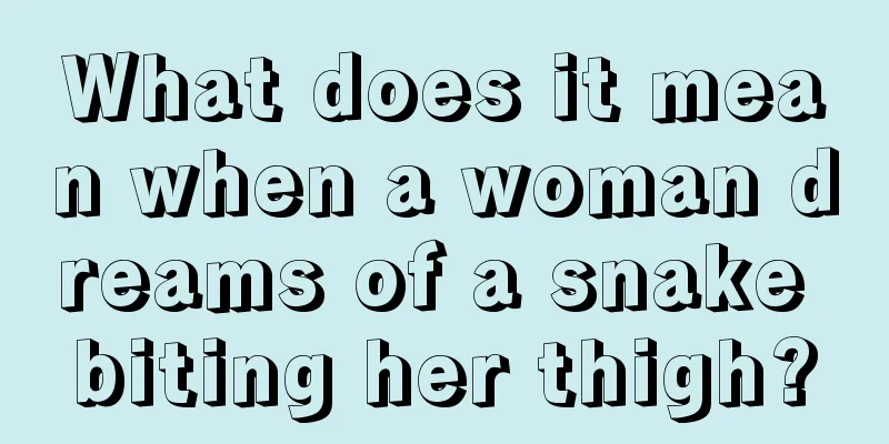 What does it mean when a woman dreams of a snake biting her thigh?