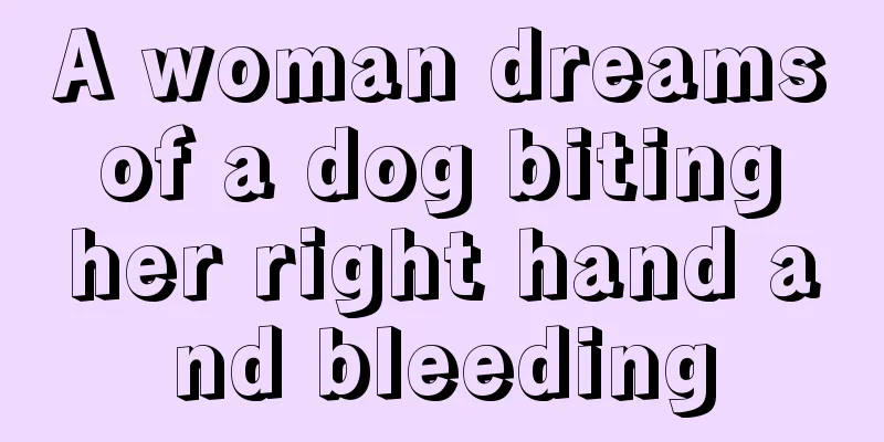 A woman dreams of a dog biting her right hand and bleeding