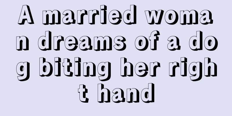 A married woman dreams of a dog biting her right hand