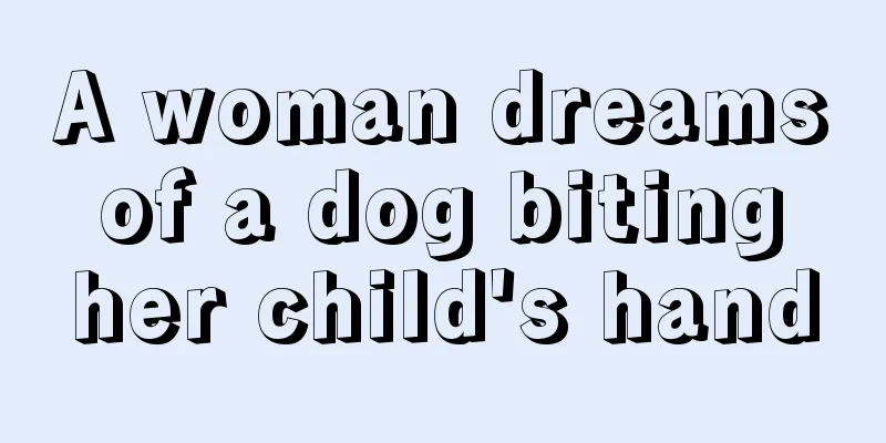 A woman dreams of a dog biting her child's hand