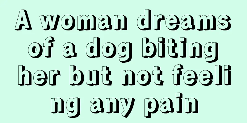 A woman dreams of a dog biting her but not feeling any pain