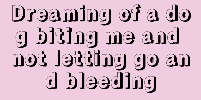 Dreaming of a dog biting me and not letting go and bleeding