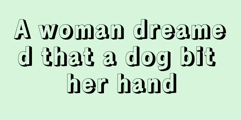 A woman dreamed that a dog bit her hand