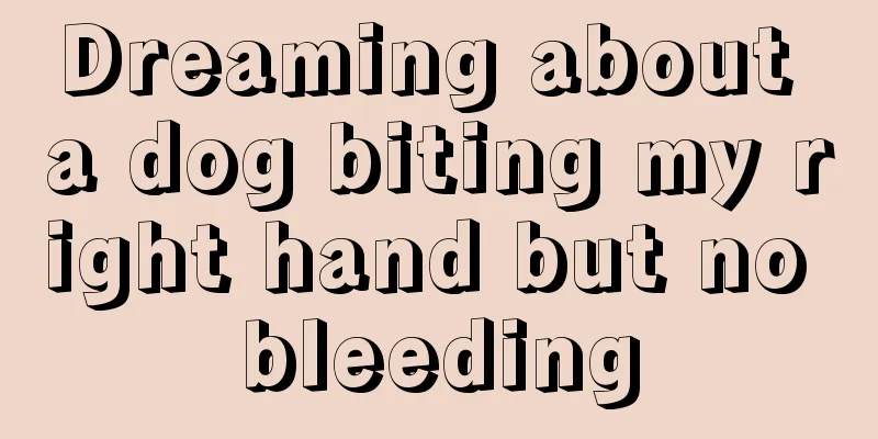 Dreaming about a dog biting my right hand but no bleeding