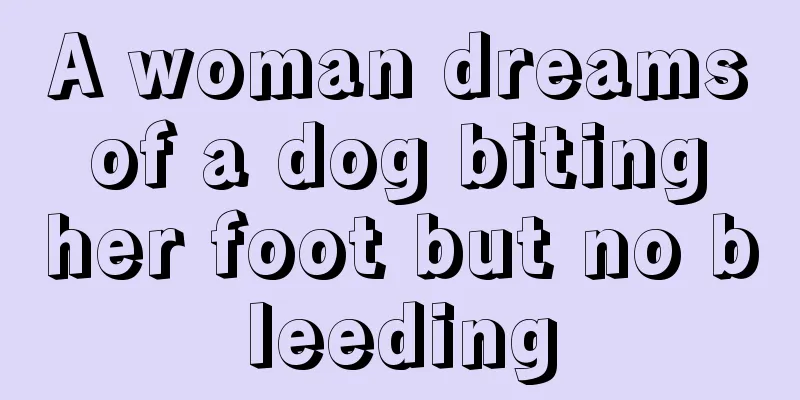 A woman dreams of a dog biting her foot but no bleeding