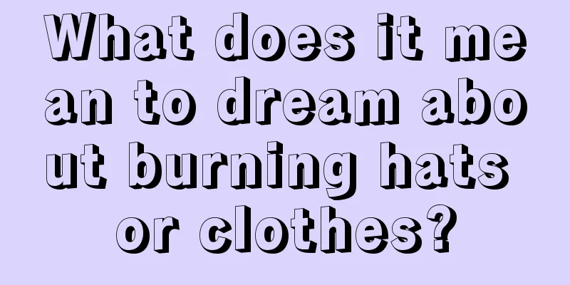 What does it mean to dream about burning hats or clothes?