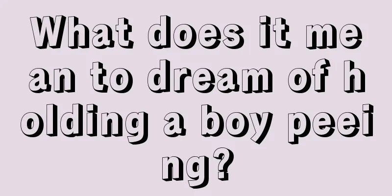 What does it mean to dream of holding a boy peeing?