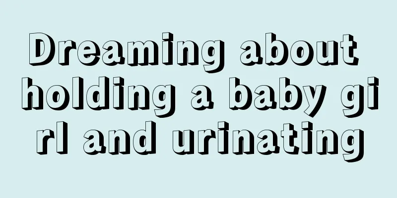 Dreaming about holding a baby girl and urinating