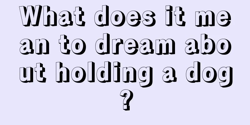 What does it mean to dream about holding a dog?