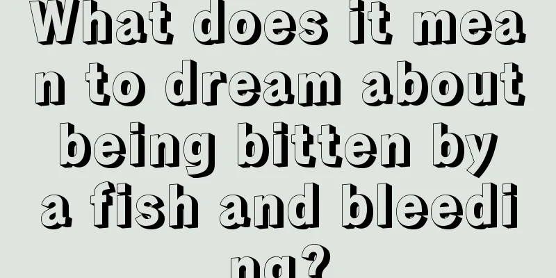 What does it mean to dream about being bitten by a fish and bleeding?