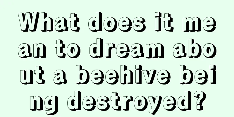 What does it mean to dream about a beehive being destroyed?