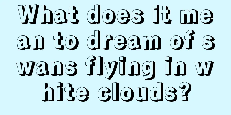 What does it mean to dream of swans flying in white clouds?