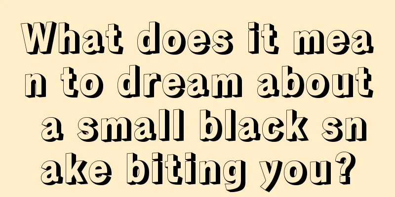 What does it mean to dream about a small black snake biting you?