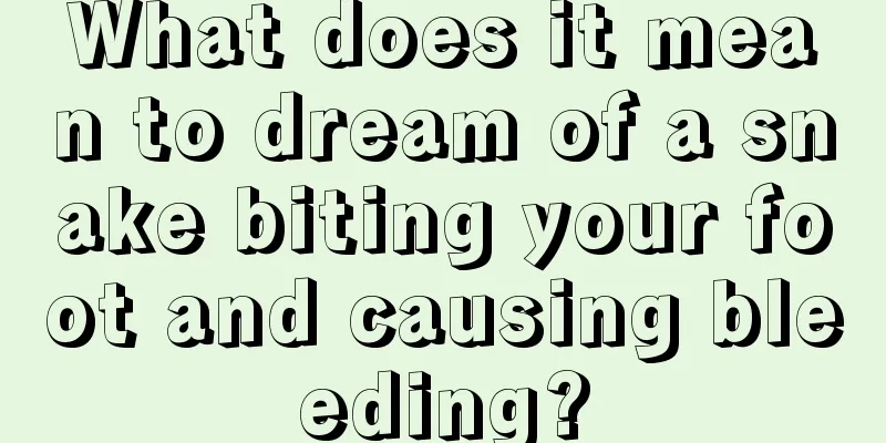 What does it mean to dream of a snake biting your foot and causing bleeding?