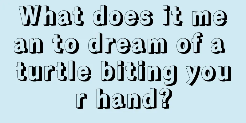 What does it mean to dream of a turtle biting your hand?