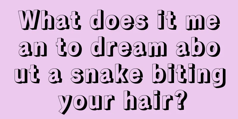 What does it mean to dream about a snake biting your hair?