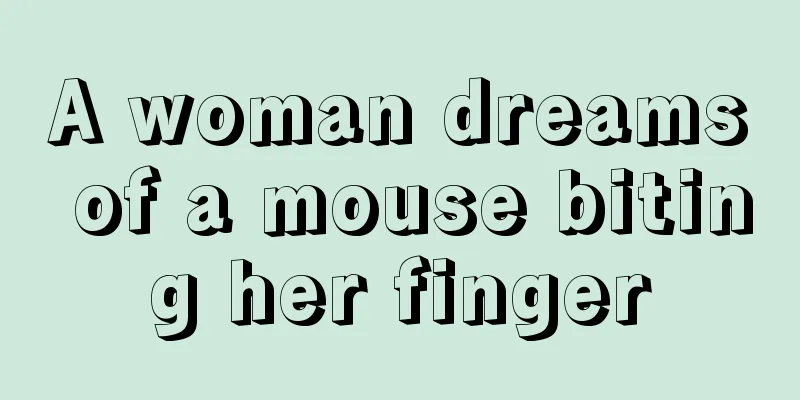 A woman dreams of a mouse biting her finger