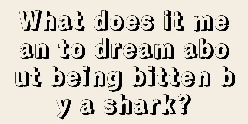 What does it mean to dream about being bitten by a shark?