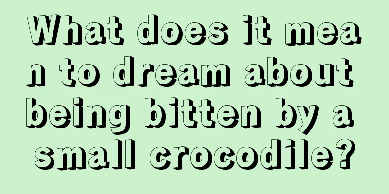 What does it mean to dream about being bitten by a small crocodile?