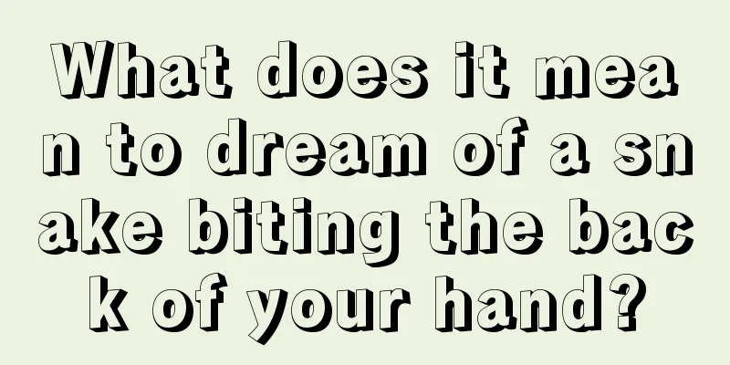 What does it mean to dream of a snake biting the back of your hand?