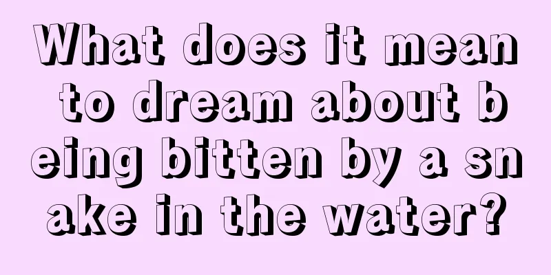 What does it mean to dream about being bitten by a snake in the water?