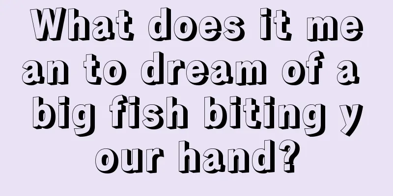 What does it mean to dream of a big fish biting your hand?