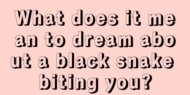 What does it mean to dream about a black snake biting you?