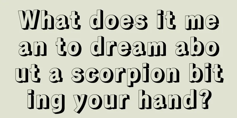 What does it mean to dream about a scorpion biting your hand?