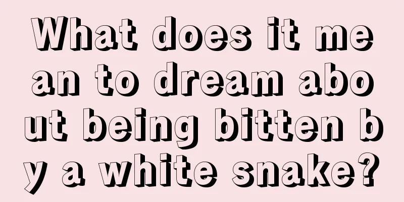 What does it mean to dream about being bitten by a white snake?