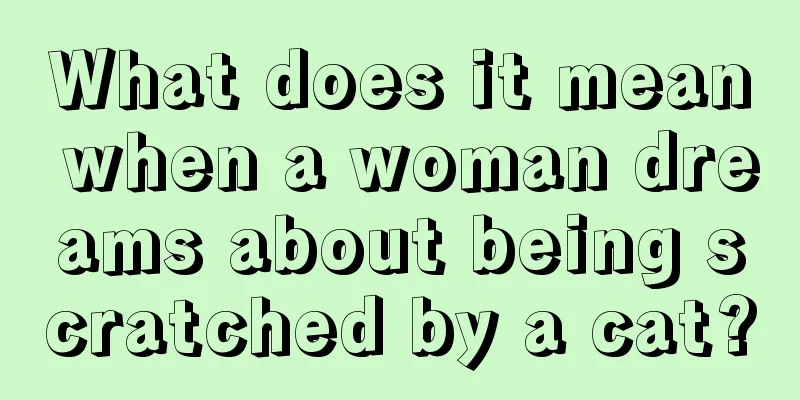 What does it mean when a woman dreams about being scratched by a cat?