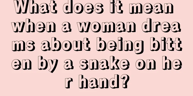 What does it mean when a woman dreams about being bitten by a snake on her hand?