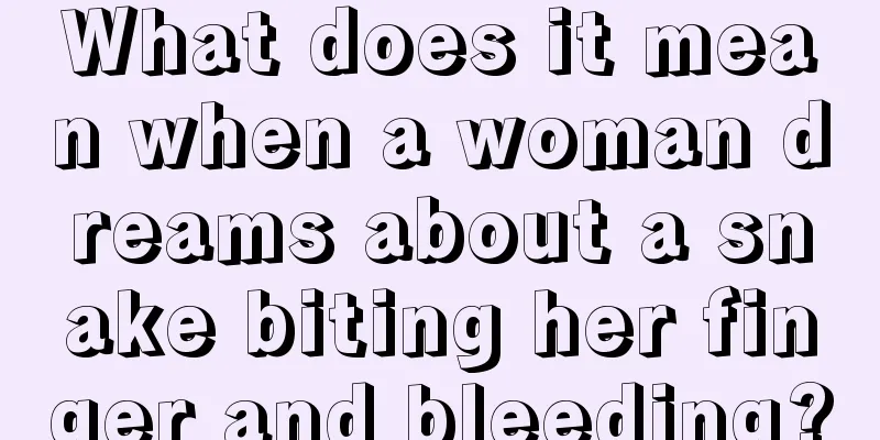 What does it mean when a woman dreams about a snake biting her finger and bleeding?