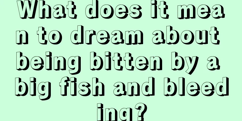 What does it mean to dream about being bitten by a big fish and bleeding?