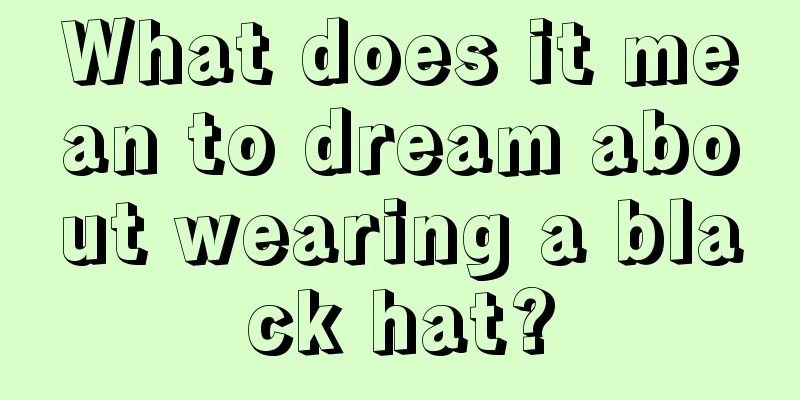 What does it mean to dream about wearing a black hat?