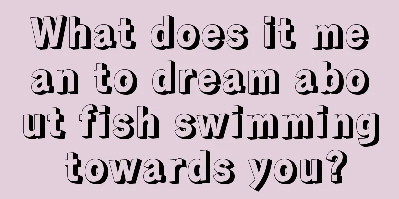 What does it mean to dream about fish swimming towards you?