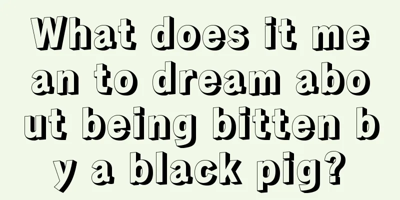 What does it mean to dream about being bitten by a black pig?