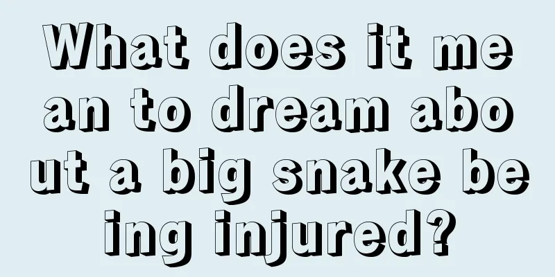 What does it mean to dream about a big snake being injured?