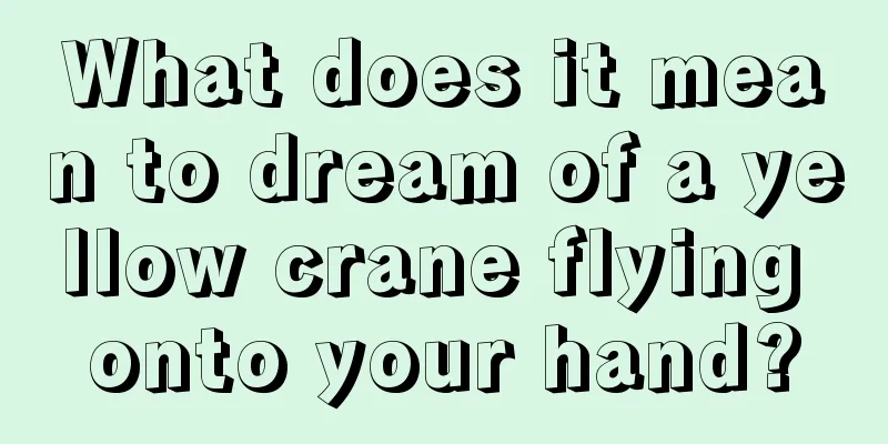 What does it mean to dream of a yellow crane flying onto your hand?