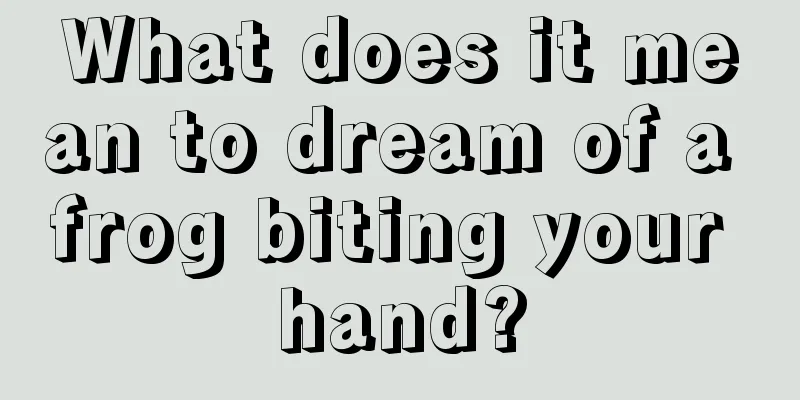 What does it mean to dream of a frog biting your hand?