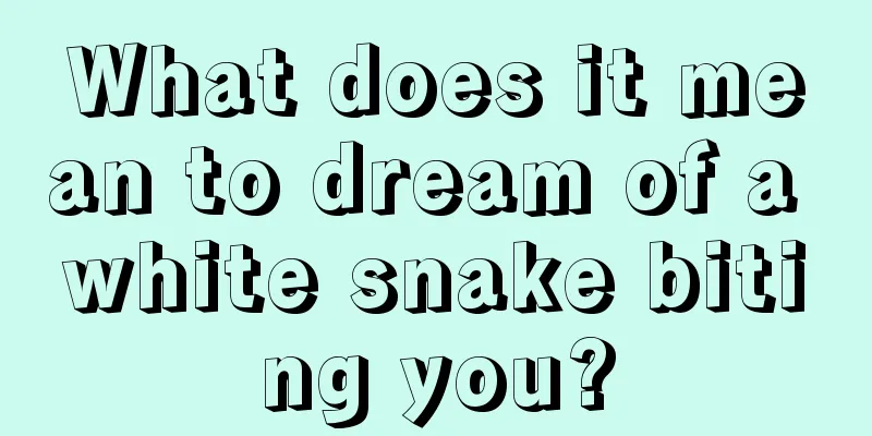 What does it mean to dream of a white snake biting you?