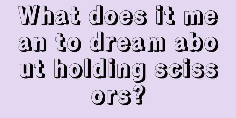 What does it mean to dream about holding scissors?