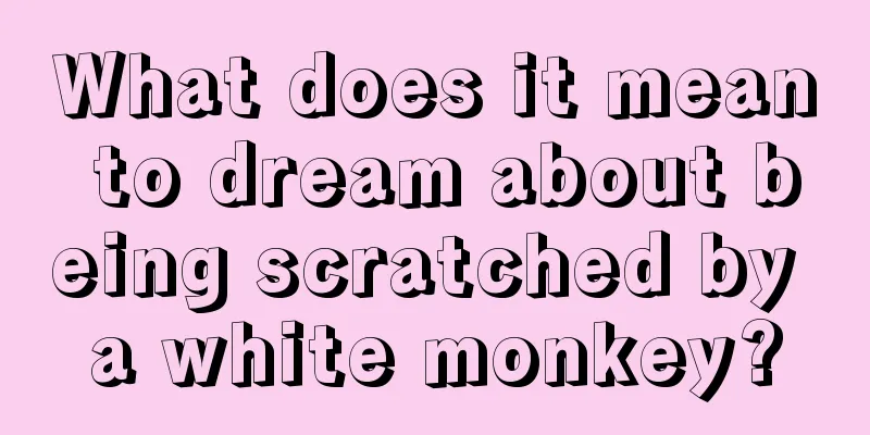 What does it mean to dream about being scratched by a white monkey?