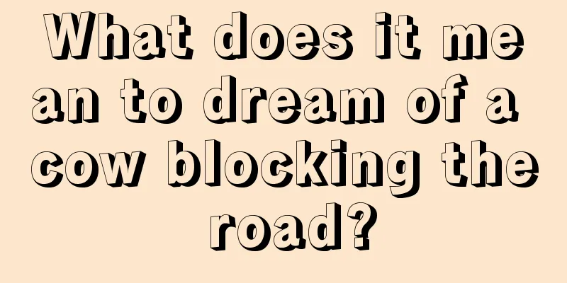 What does it mean to dream of a cow blocking the road?