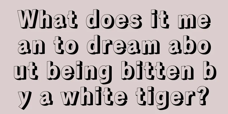 What does it mean to dream about being bitten by a white tiger?