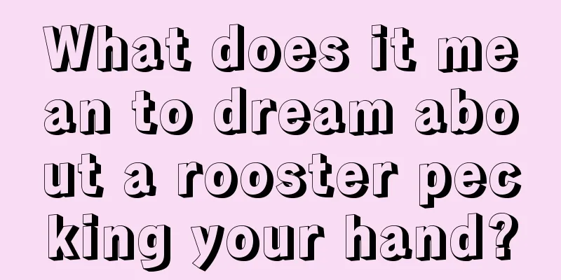 What does it mean to dream about a rooster pecking your hand?