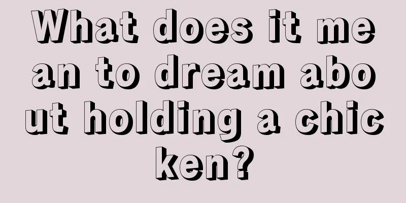 What does it mean to dream about holding a chicken?