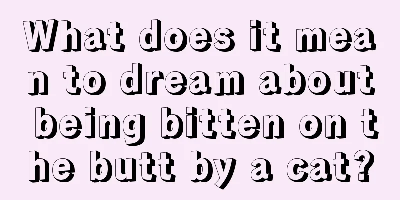 What does it mean to dream about being bitten on the butt by a cat?