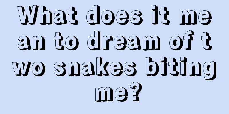 What does it mean to dream of two snakes biting me?