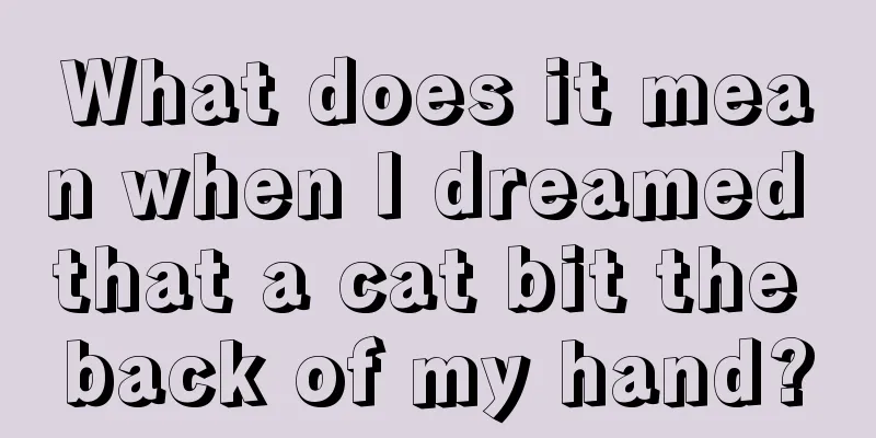 What does it mean when I dreamed that a cat bit the back of my hand?